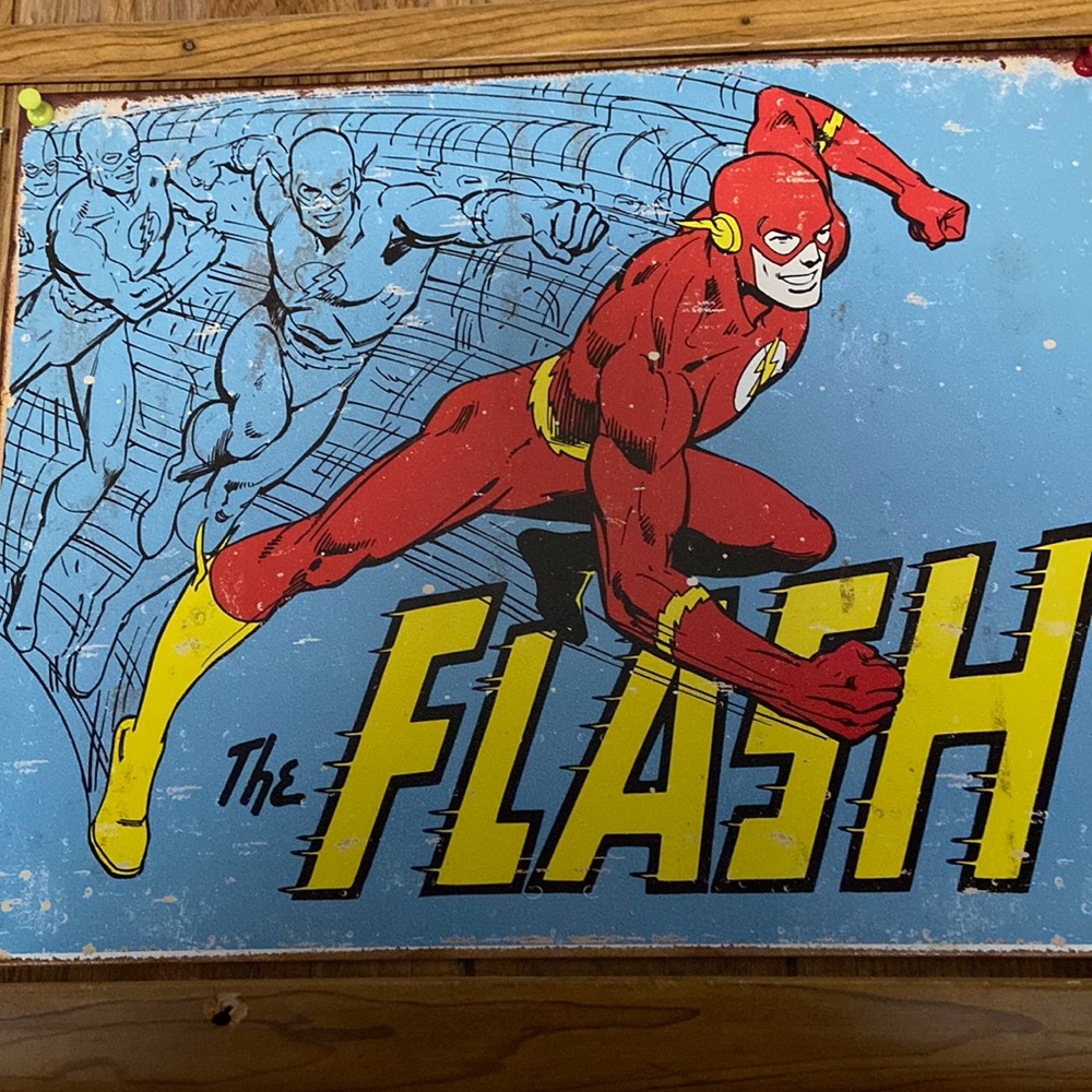 Tin flash wall hanging.